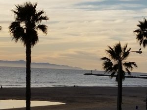 Beachfront view of Surfside I condos and the Port Hueneme Pier in Port Hueneme, California, photographed by Diane Schweers.