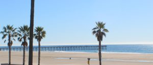 Beachfront view of Surfside I condos and the Port Hueneme Pier in Port Hueneme, California, photographed by Diane Schweers.